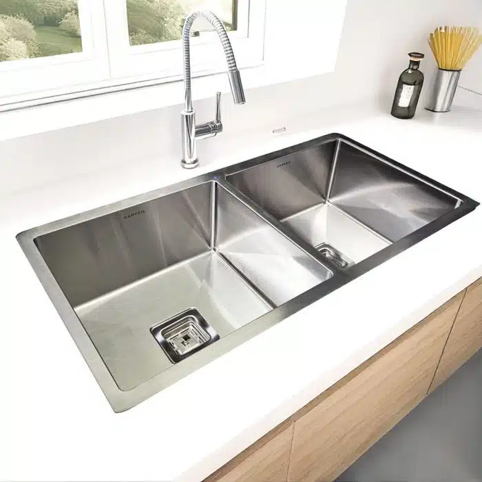 Carysil Stainless Steel Double Bowl Kitchen Sink Quadro R10 installed in a bright kitchen space