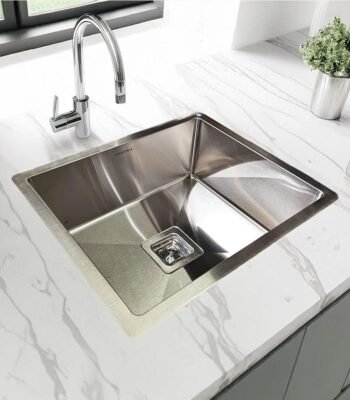 Carysil Cordro R10 Stainless Steel Kitchen Sink 21x18 in use, installed in a contemporary kitchen