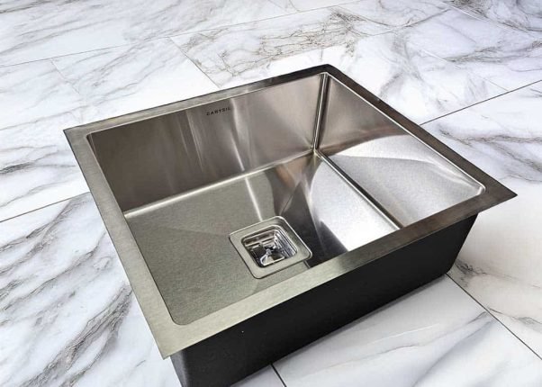 Top view of Carysil Stainless Steel Kitchen Sink Cordro R10 21x18, 8-inch depth on white background