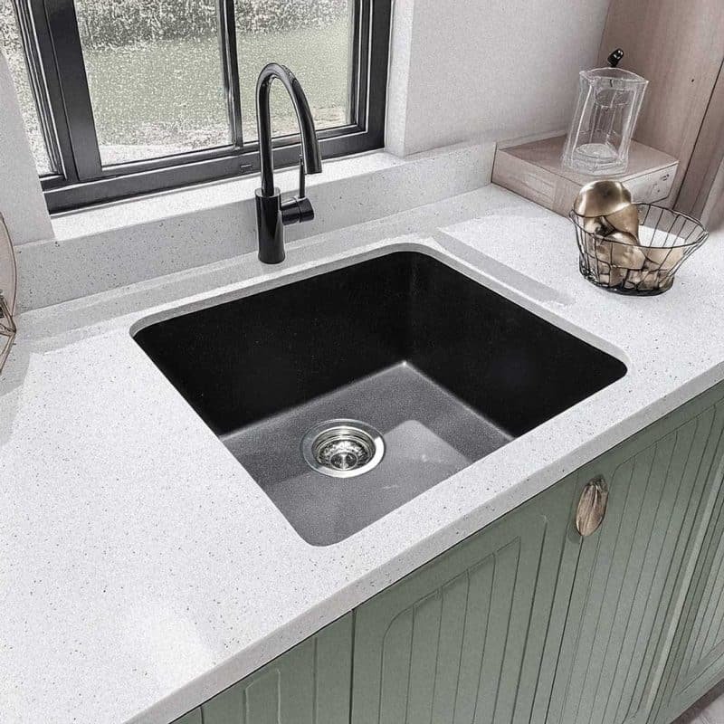 Carysil Quartz Kitchen Sink Salsa 21x18 Granite Metallic Nera installed in a modern kitchen