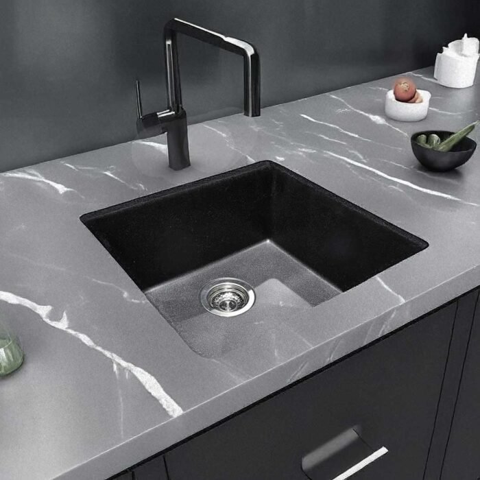 Carysil Salsa Quartz Kitchen Sink 21x18 Granite Metallic Nera in use in a live kitchen setting