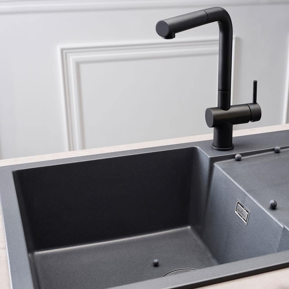 Close-up of the Reginox Amsterdam 10 single bowl black silvery quartz/granite kitchen sink.
