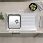 Close-up of the drainboard on the Reginox Centurio 10 single bowl stainless steel kitchen sink.