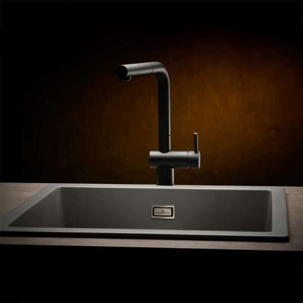 Reginox Amsterdam 50 quartz kitchen sink with dishes, showing its functionality