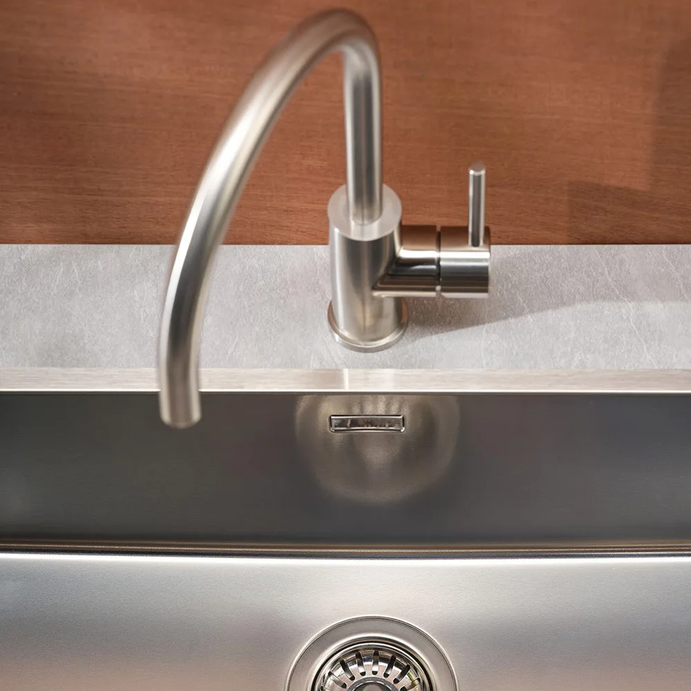 Close-up of Reginox New York 70x40 kitchen sink, showing stainless steel finish and bowl